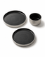 Handmade black and grey ceramic dinnerware set with dinner plate, side plate and bowl
