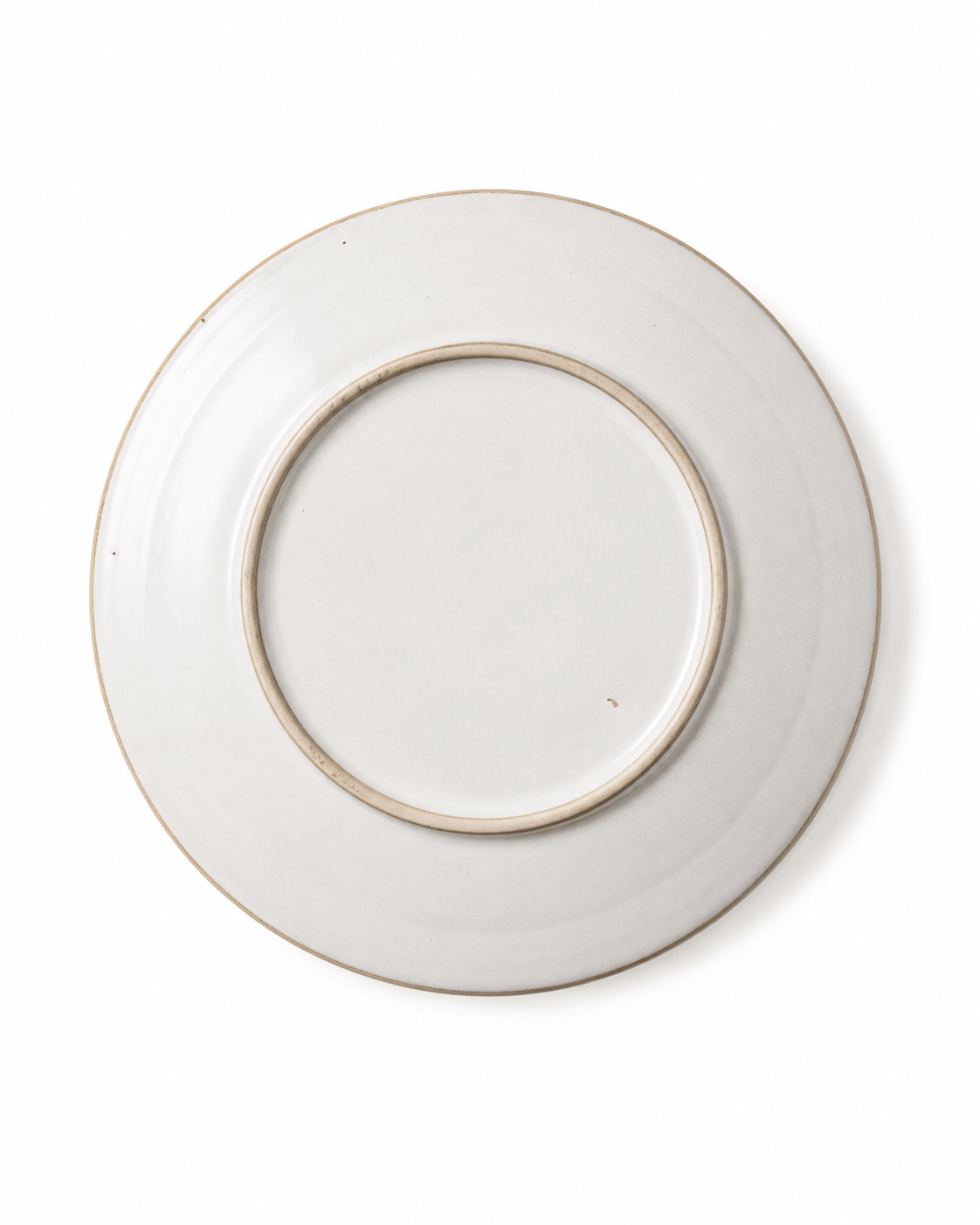 Bottom view of 10 inch ivory white handmade ceramic dinner plate showing raised foot ring