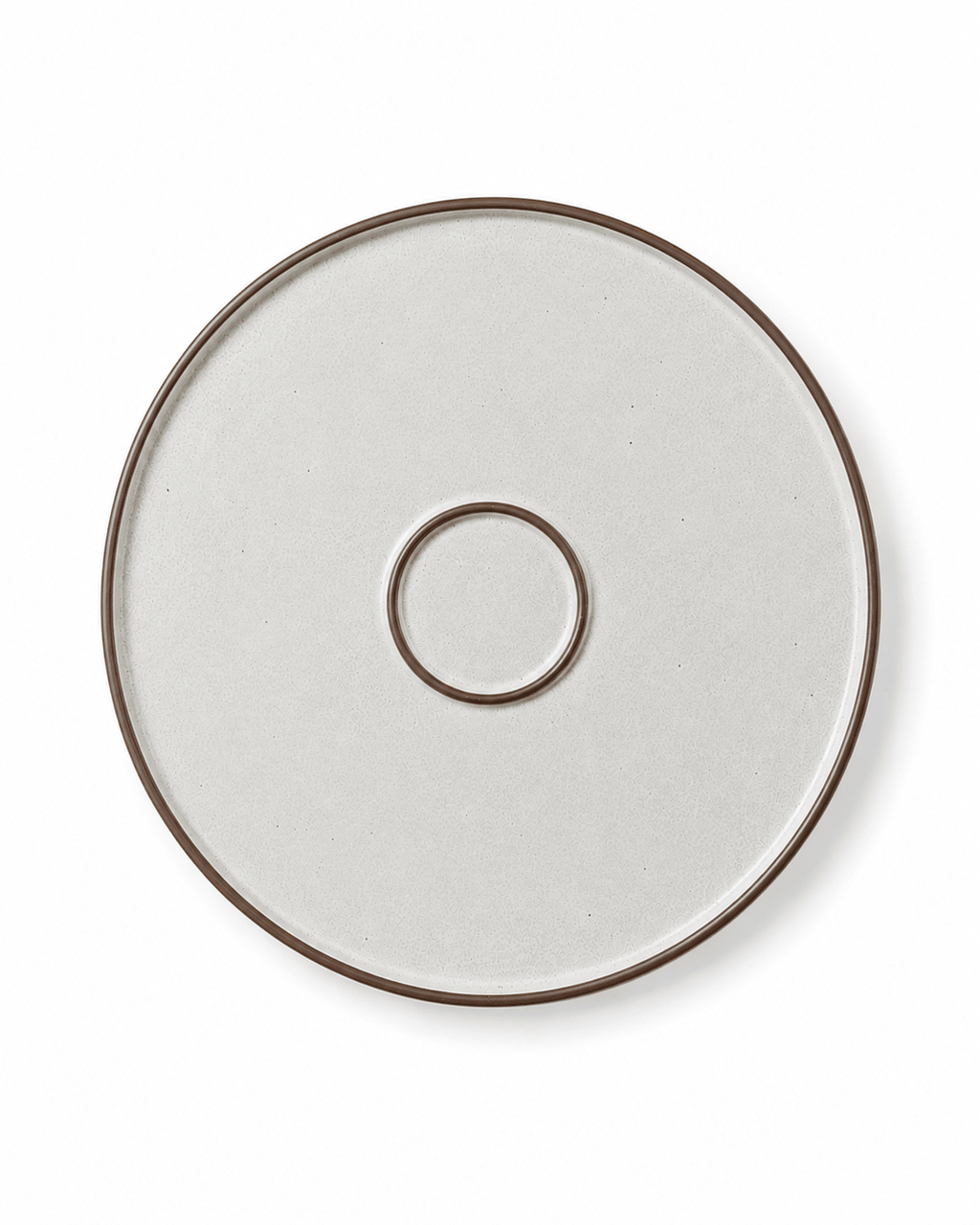Bottom view of a speckled ceramic dinner plate with brown rim and circular foot ring