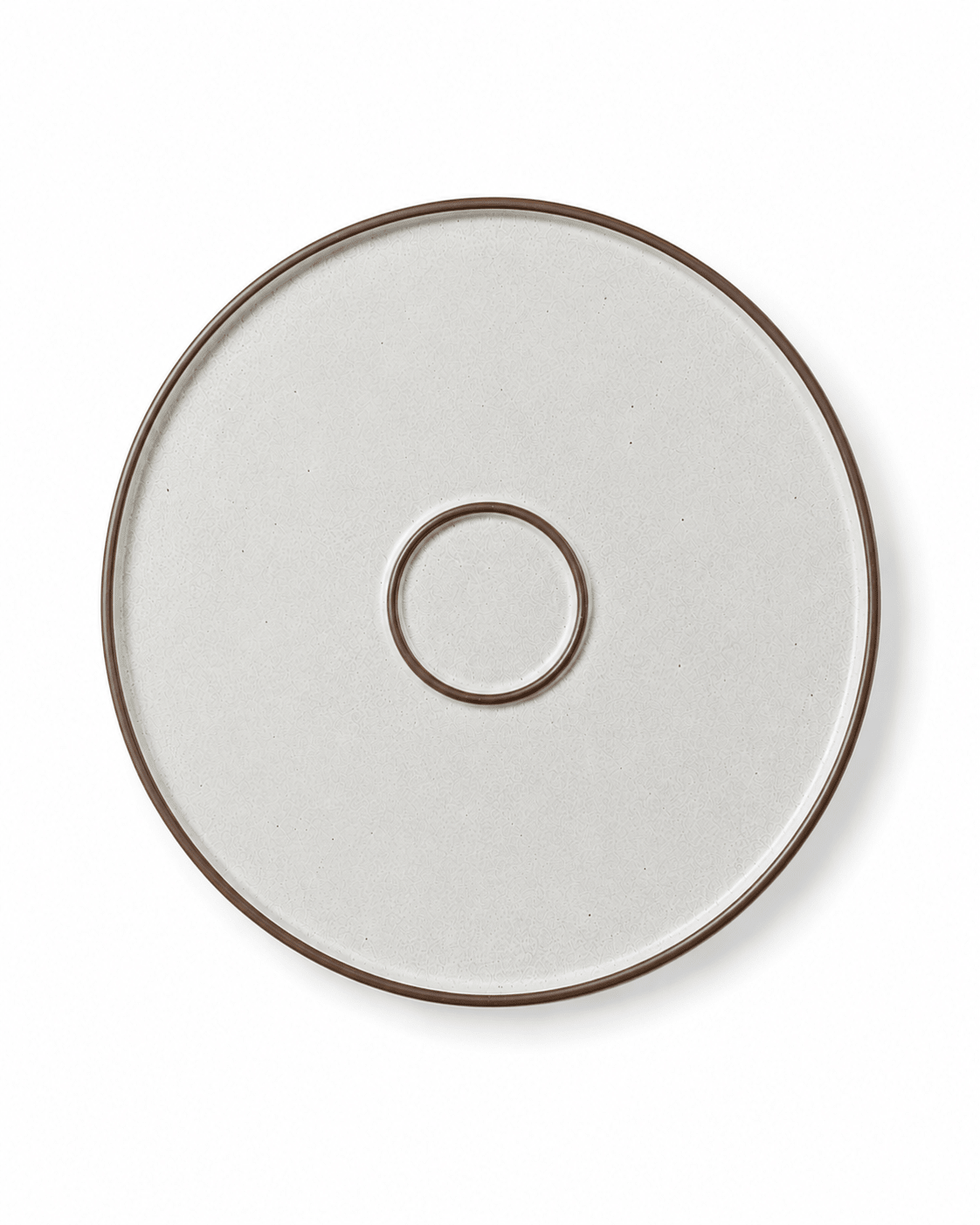 Bottom view of a speckled ceramic dinner plate with brown rim and circular foot ring