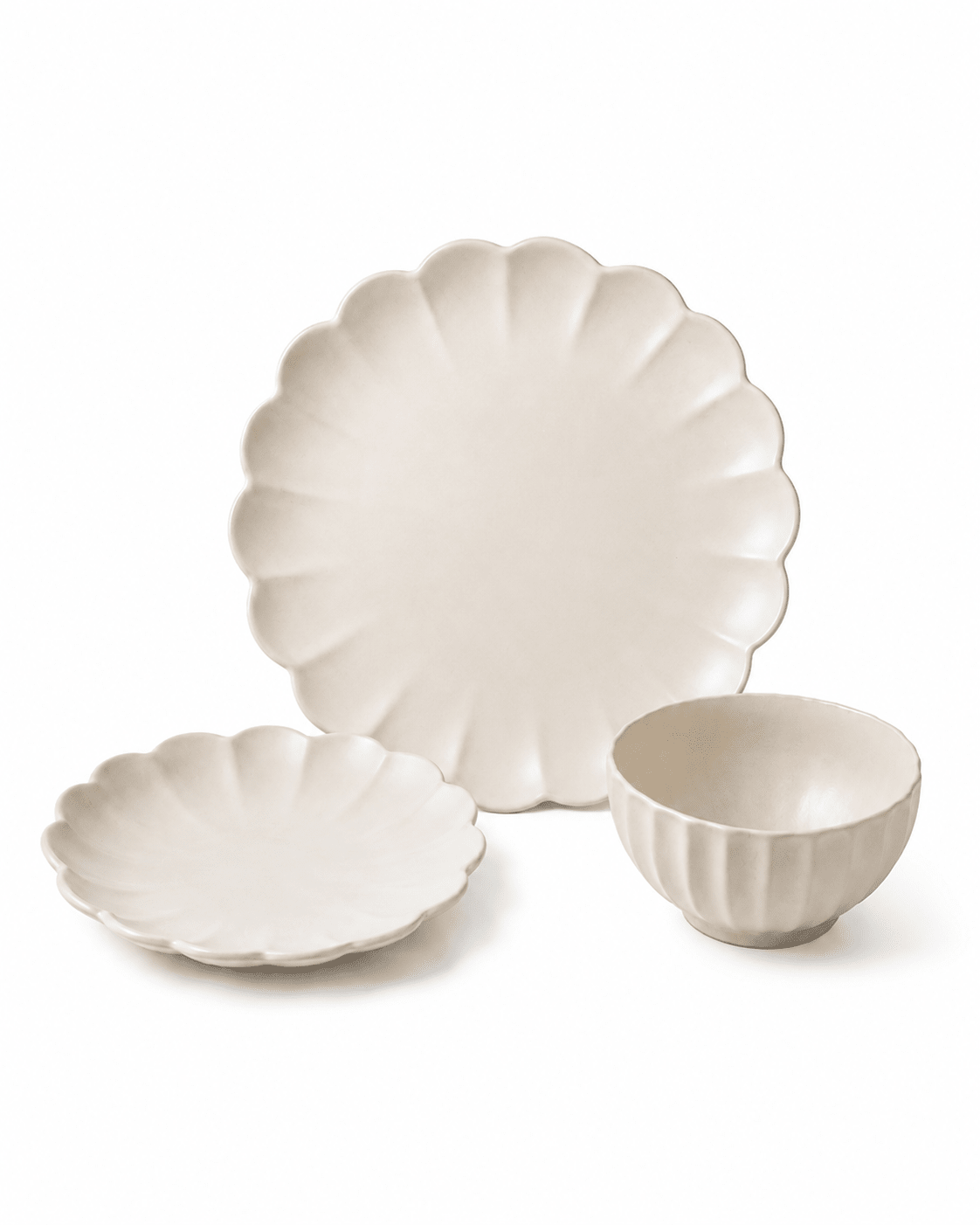 Ivory scalloped ceramic dinnerware set with large plate, small plate, and bowl arranged on a white background. Main image