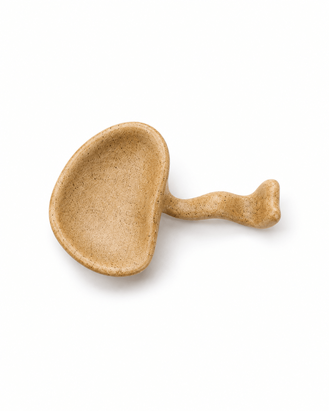 Top view of handmade beige speckled ceramic soy sauce dish with integrated curved chopstick rest Main image