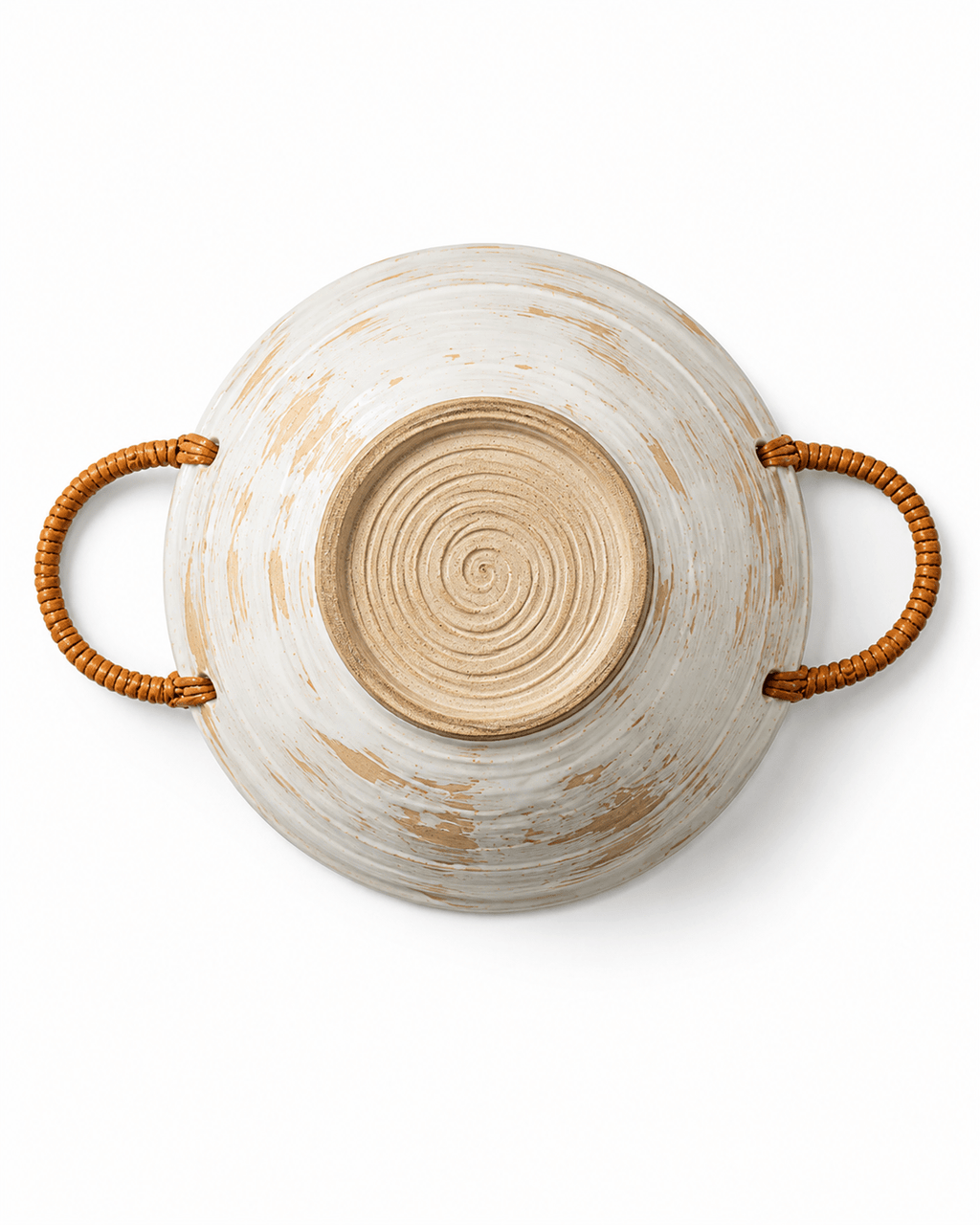 Bottom view of a handmade ceramic bowl with woven rattan handles, natural clay base and visible pottery wheel texture