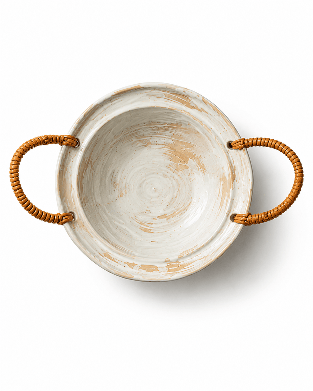 Top view of a handmade ceramic serving bowl with two woven rattan handles and rustic white and beige brushed glaze