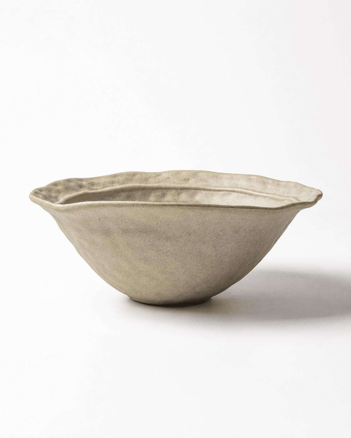 handmade-beige-wavy-rim-reactive-glaze-ceramic-pasta-bowl-side-view