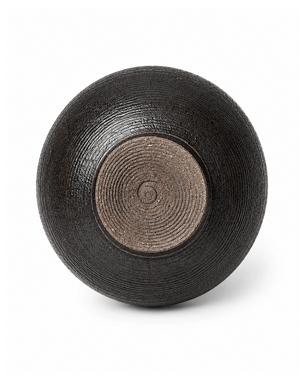 Handmade black ceramic bowl base with circular textured detailing