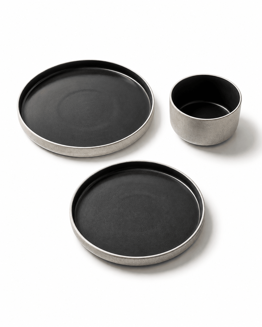 Handmade black and grey ceramic dinnerware set with dinner plate, side plate and bowl