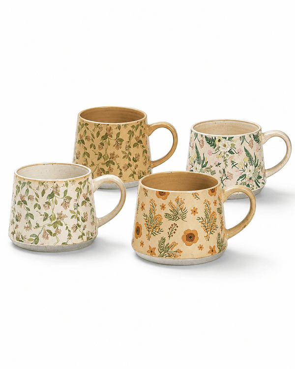 Four handmade botanical floral ceramic mugs in assorted vintage-inspired designs