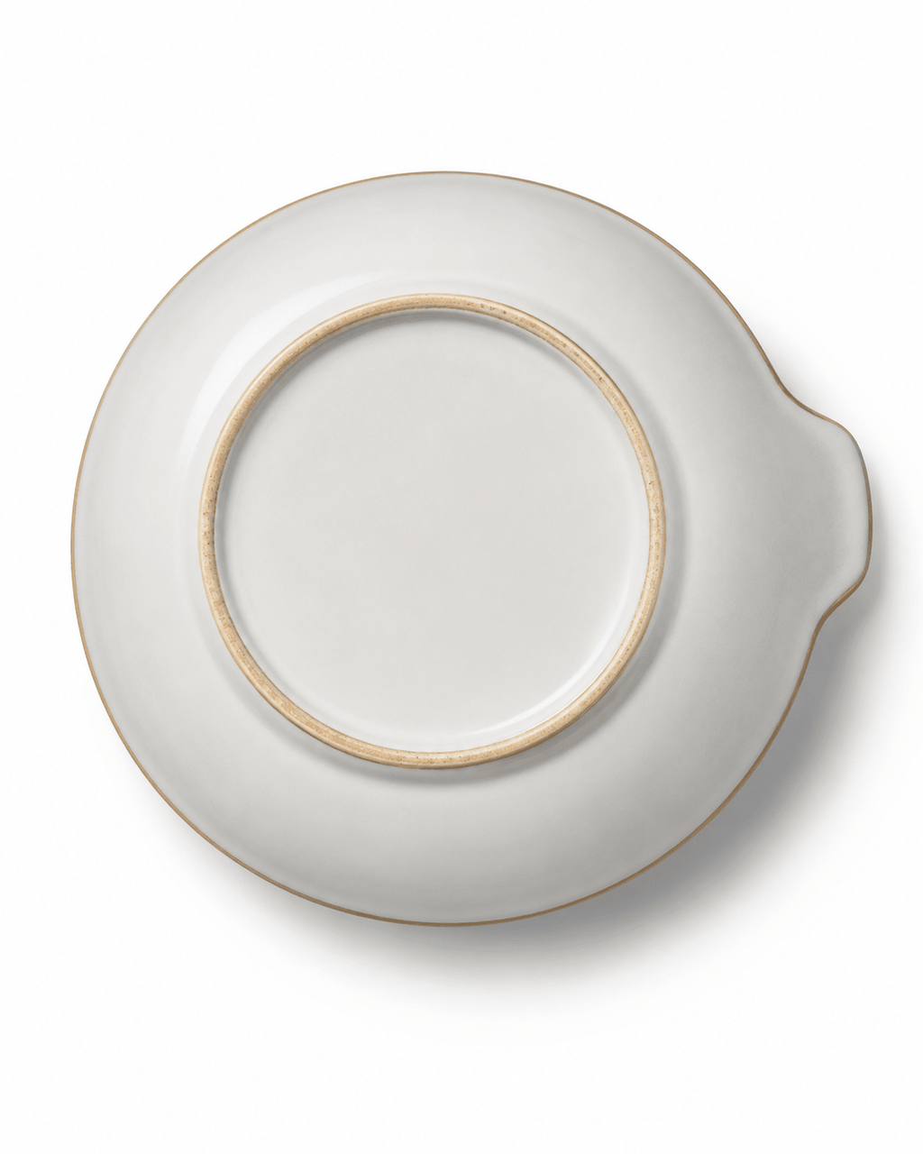 Bottom view of large handmade ceramic serving bowl showing the foot ring, ivory glaze and integrated handle