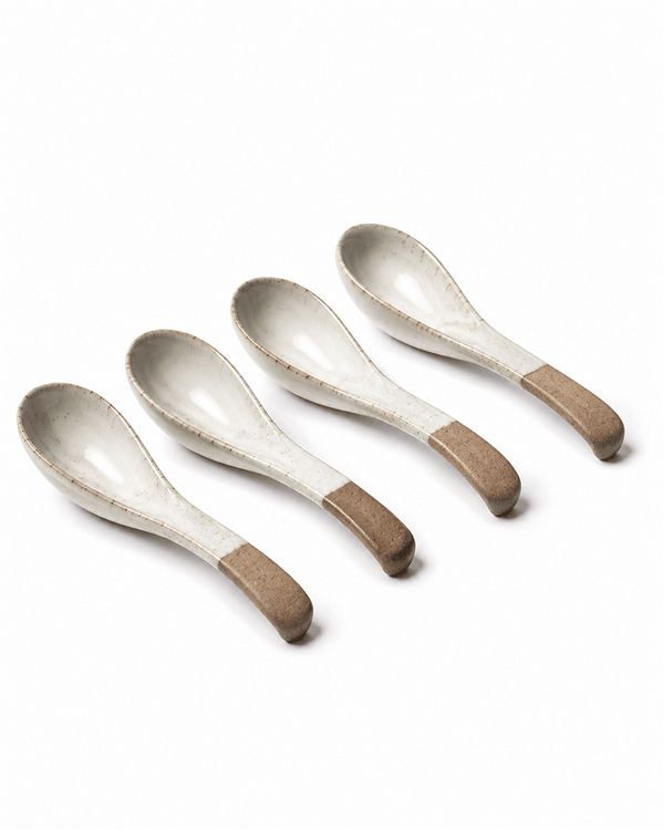 Set of handmade ceramic spoons with speckled glaze and natural clay handles