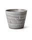 Handmade grey reactive glaze stoneware tumbler with white carved wave pattern and handleless design