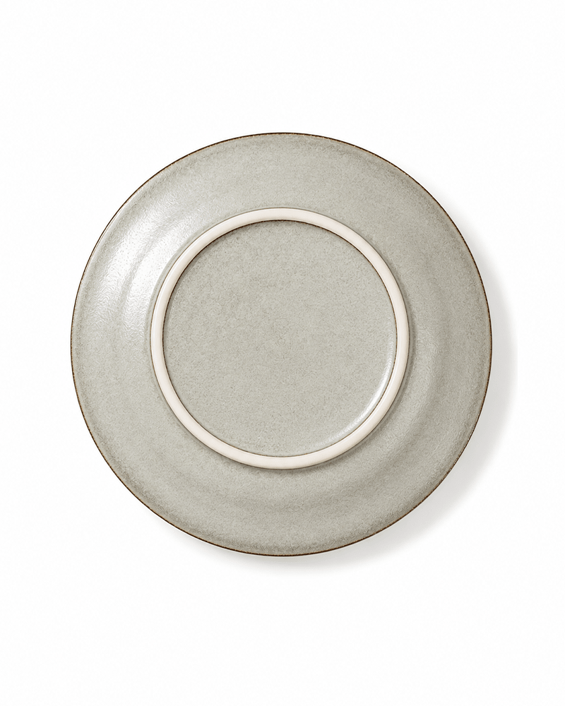 Bottom view of handmade off white reactive glaze 10.7 inch ceramic dinner plate with raised foot ring