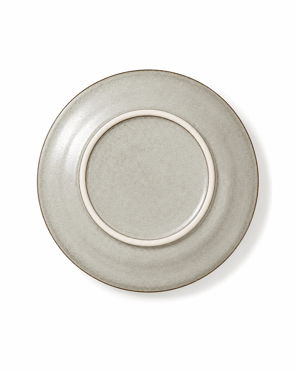 Bottom view of handmade off white reactive glaze 10.7 inch ceramic dinner plate with raised foot ring