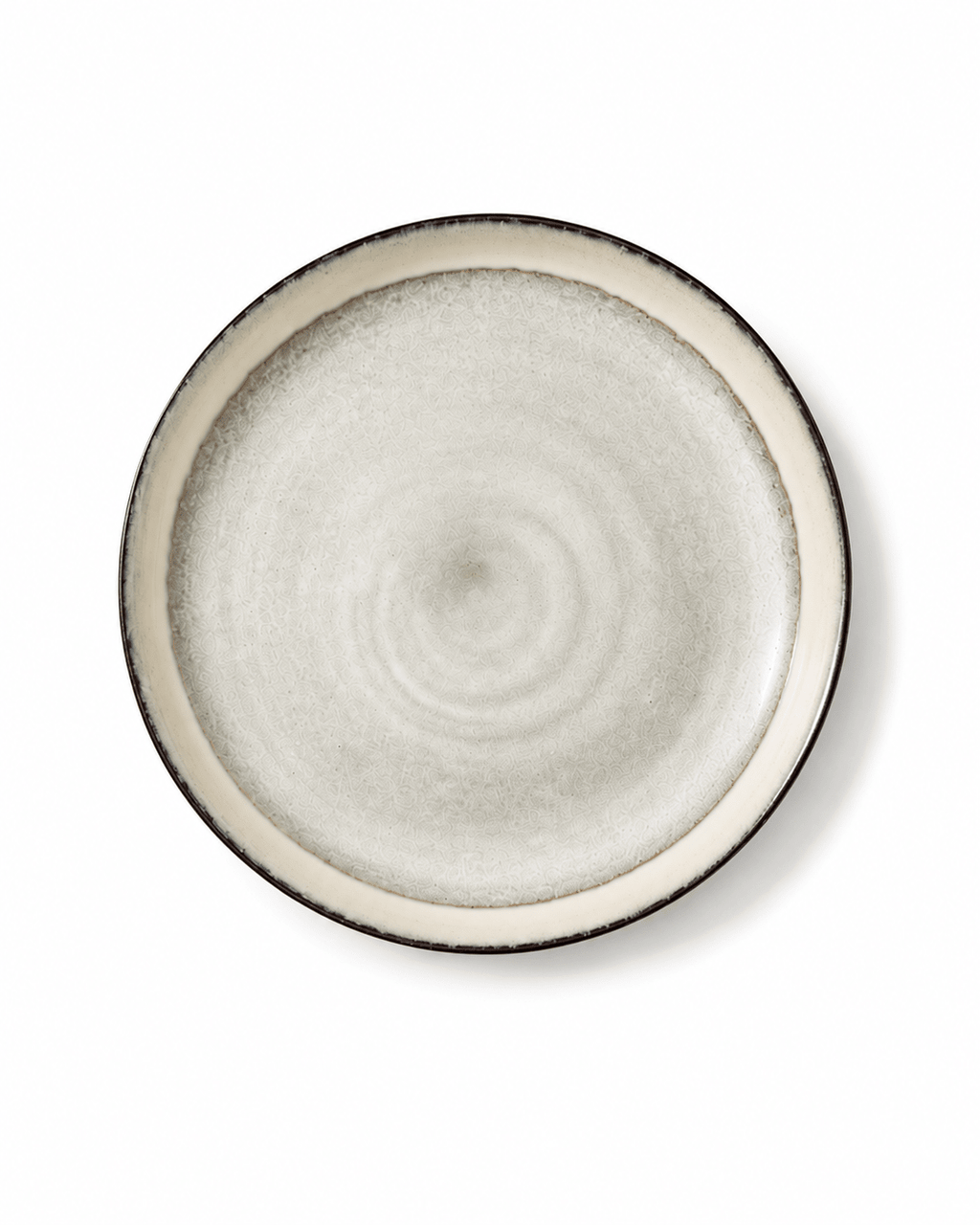 Top view of handmade off white reactive glaze 10.7 inch ceramic dinner plate with dark rim