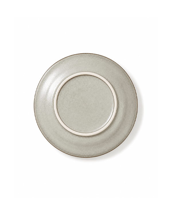 Bottom view of handmade off white reactive glaze 8 inch ceramic salad plate with raised foot ring