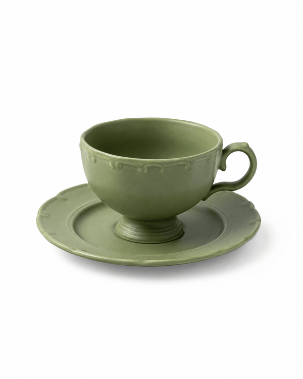 Handmade olive green ceramic coffee cup and saucer set with scalloped details and pedestal base