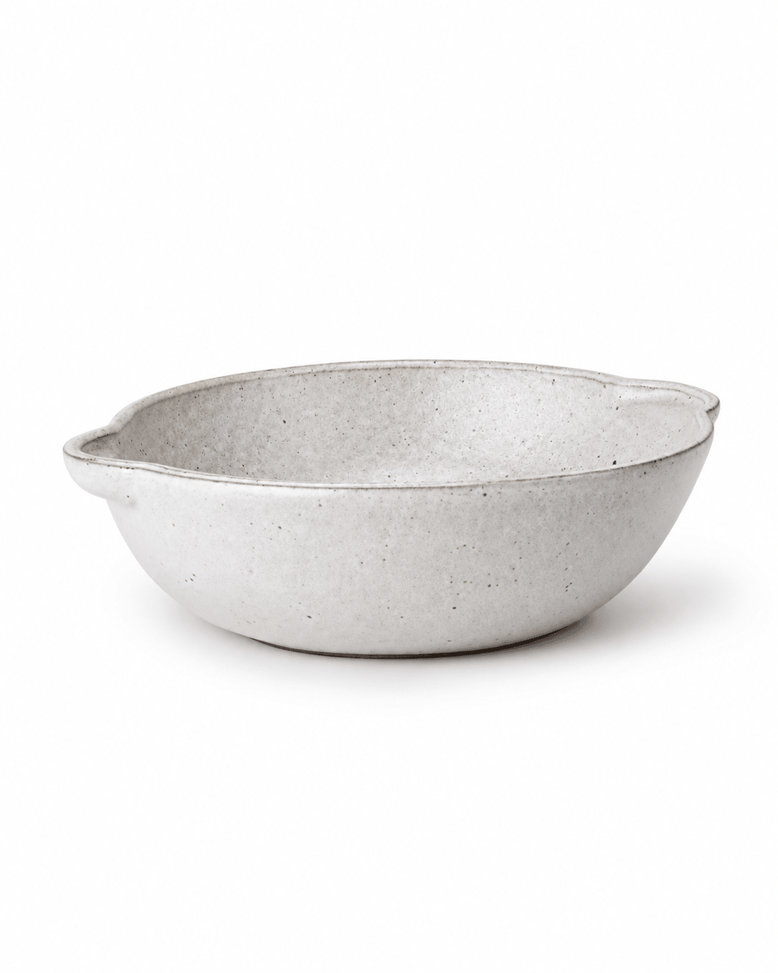 Side view of handmade off-white speckled ceramic serving bowl with double ear handles Main image