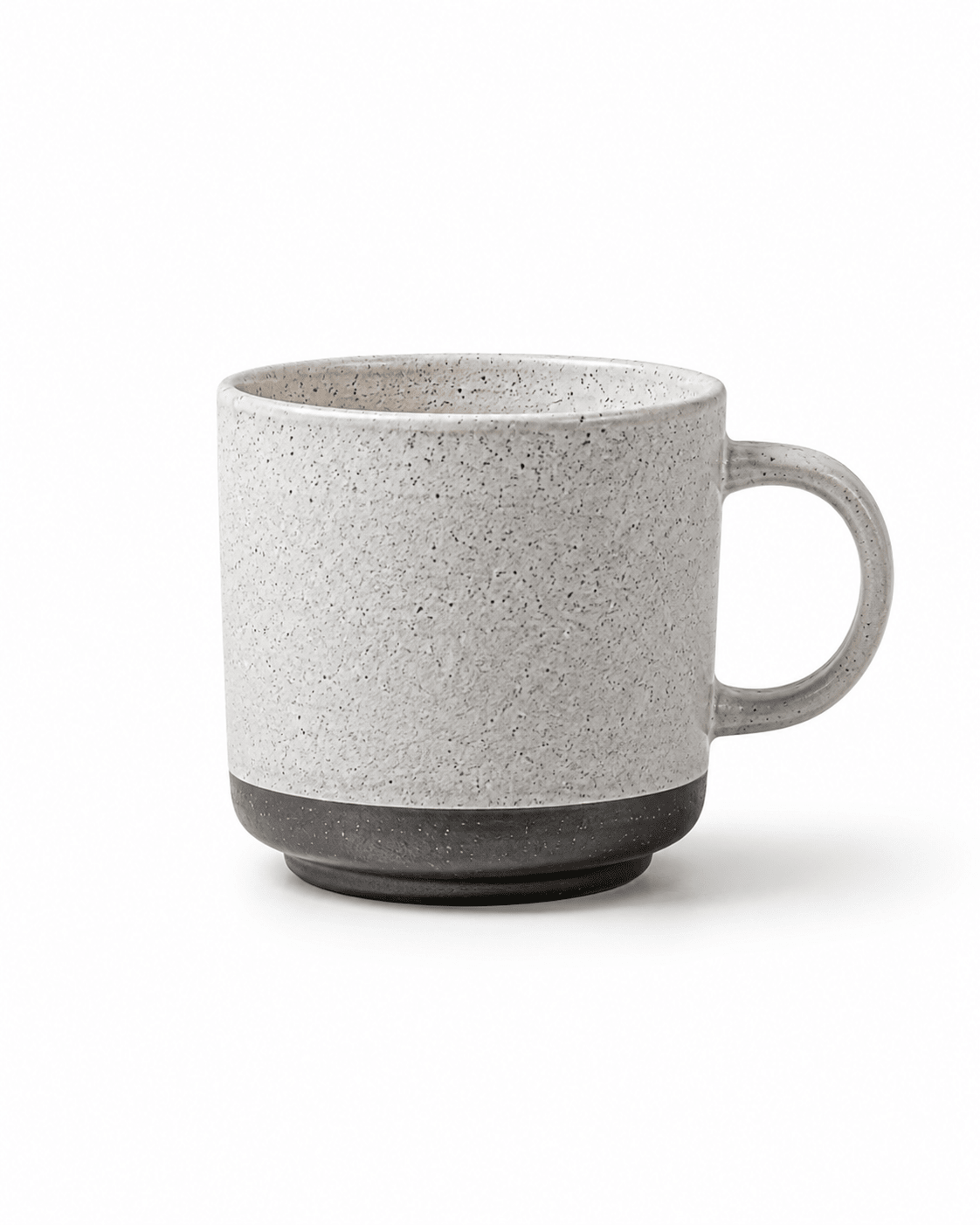 Handmade speckled stoneware coffee mug in off-white with a contrasting dark ceramic base and round handle