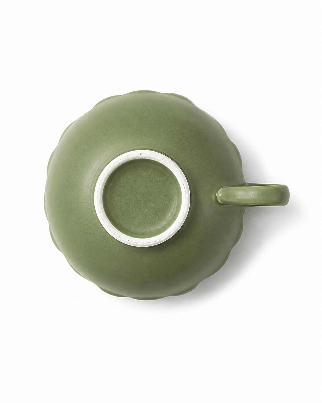 Bottom view of olive green handmade ceramic coffee cup showing unglazed foot ring and handle