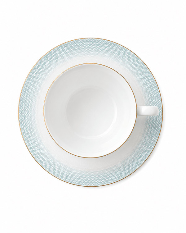 Top view of white textured fine bone china mug with curved handle