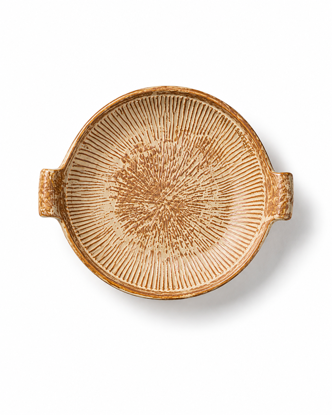 Top view of a rustic ceramic serving platter with two handles and hand-finished radial textured pattern